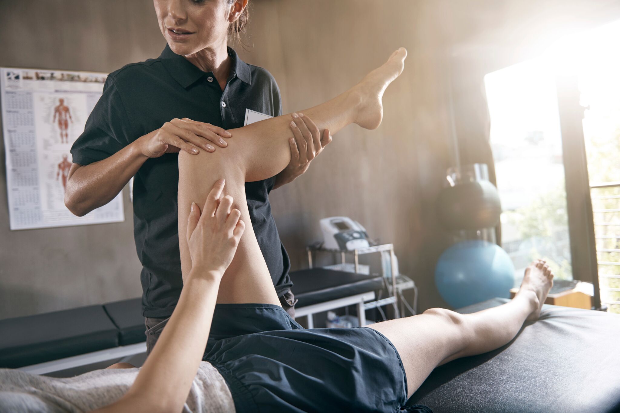 Physiotherapist treating a patient